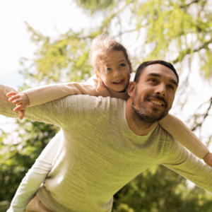 guardianship, american father carrying his daughter on his back