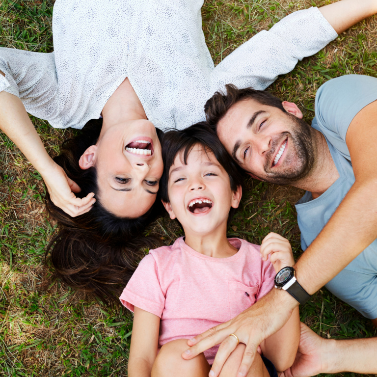 family having fun on the grass